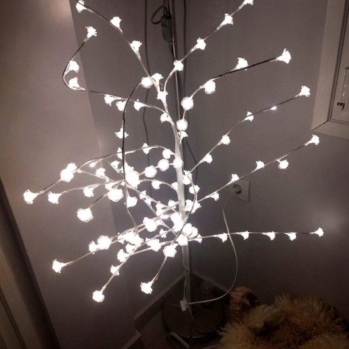 Decorative tree with roses used with lights and metal base