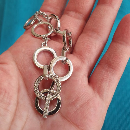 Swarovski bracelet like new, silver tone, adjustable 19 cm
