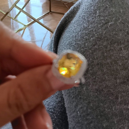 Ring new with large central yellow zircon and white zircons