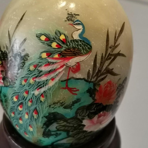 Asian marble egg used with hand-painted design and wooden base
