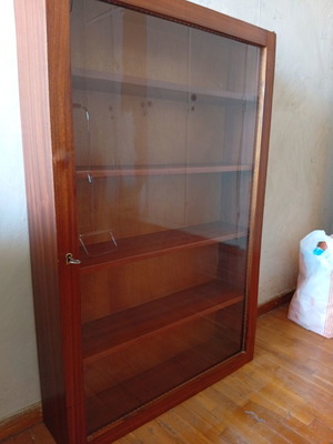 Vintage wooden wall showcase with glass and shelves, used