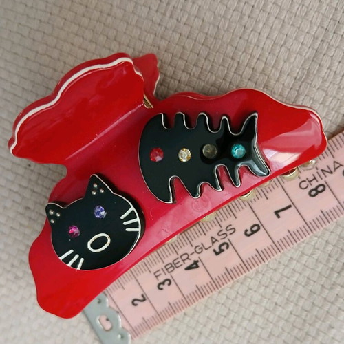Artstar hair clip red with cat design like new