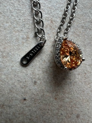 Steel necklace new with orange and silver hypoallergenic pendant