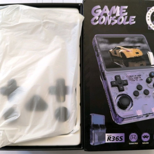 R36S game console like new with 64GB and many games