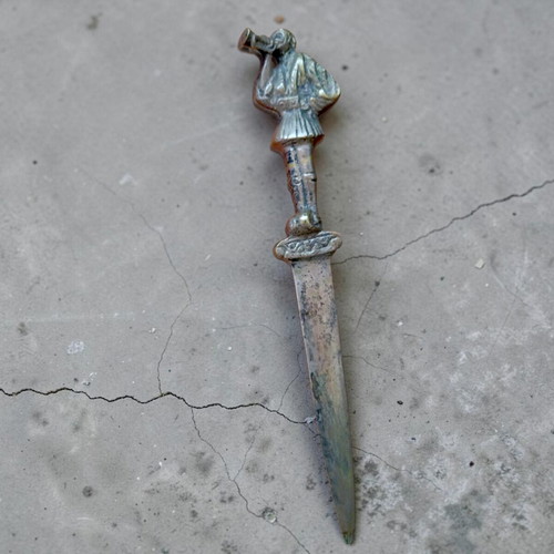 Vintage collectible letter opener with tsolias figure used