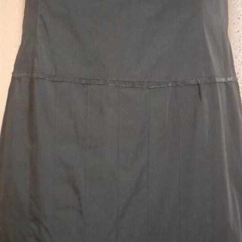 VS black sleeveless dress with round neckline and pleats, size 50