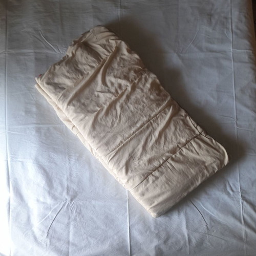 Single bed quilt used, reversible beige and red