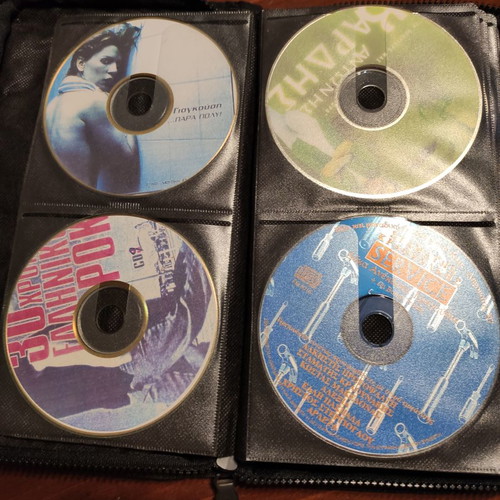 Set of 48 used music CDs with free case
