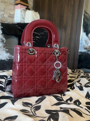 Dior handheld bag, burgundy patent leather with silver details