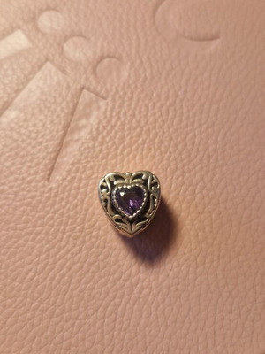 Silver heart with purple stone like new