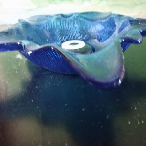 Star-shaped glass ashtray used, decorative