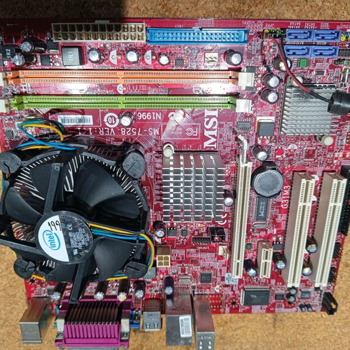 MSI G31M3-F motherboard used with Intel processor and heatsink