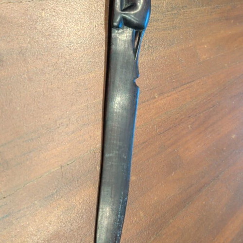 Wooden paper cutter used with handmade African art carving
