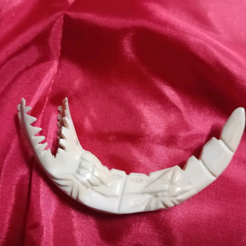 Crocodile made of camel bone used, in very good condition