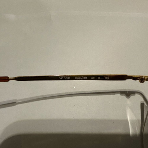 Oval Vogue optical glasses with tortoise details and gold frame, new