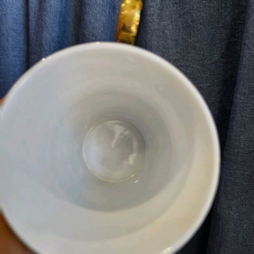 porcelain mug with gold inscriptions
