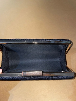 Evening bag used, handheld, without strap