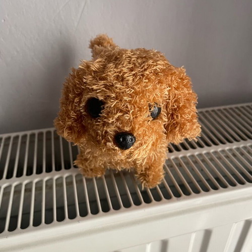 Dog toy that makes sound and moves like new