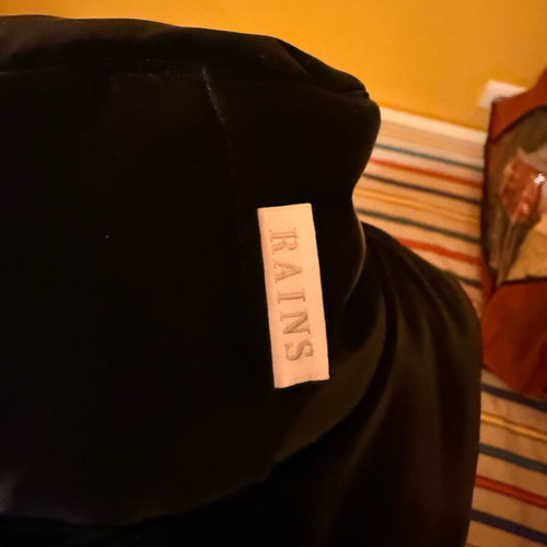 Rains hat black size S used, minimal waterproof texture