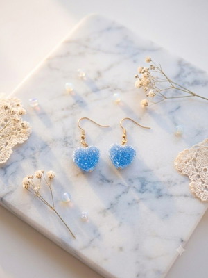 Earrings with blue puffed hearts, like new, steel clasp