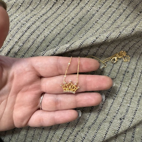 Necklace in gold color with crown design like new