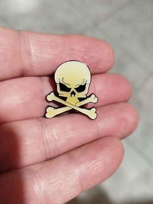 Skull pin badge with enamel coating