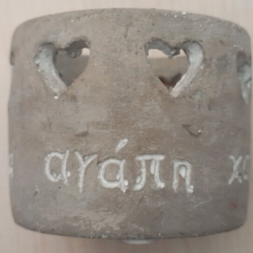 Handmade cement candle holder like new with pierced heart design