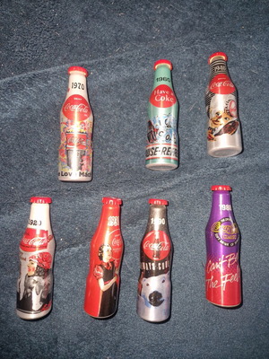 Μεταλλικά μπουκάλια συλλεκτικά Coca Cola μεταχειρισμένα, πακέτο 7
