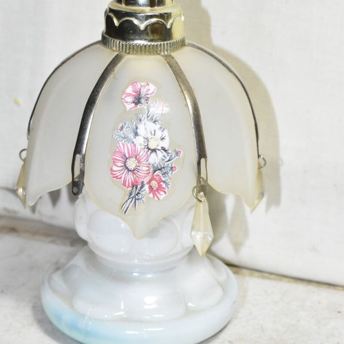 Vintage decorative miniature lamp used with floral motif