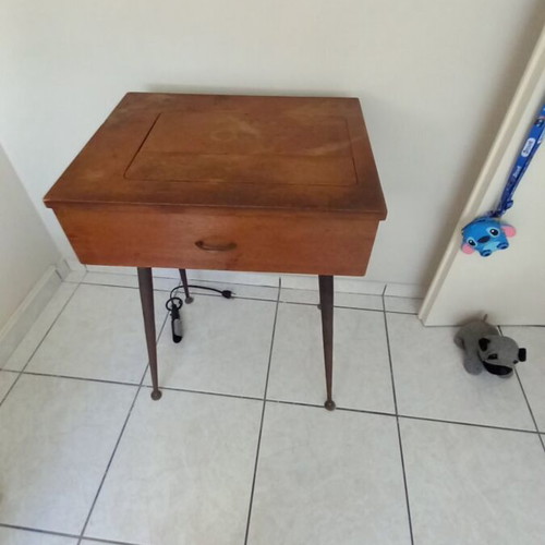 Singer sewing machine used with table