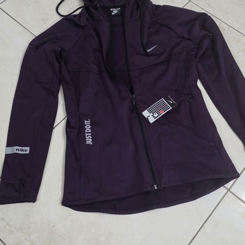 Nike women's purple sports jacket size M