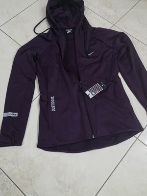 Nike women's purple sports jacket size M
