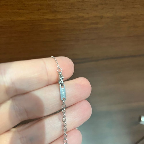 Family necklace with two boys like new, silver