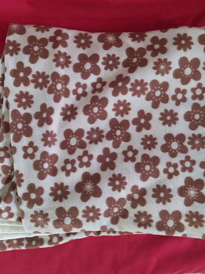 Blanket like new with flower pattern, brown and white for sofa