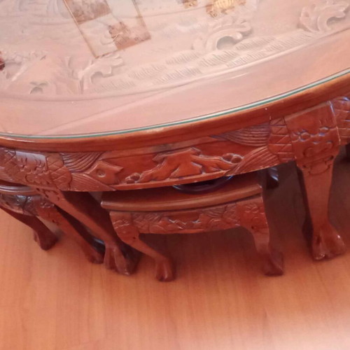 Coffee table with 6 small carved handmade stools like new, oval glass top