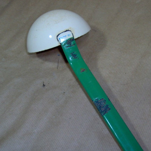 Enamel ladle vintage used with rust marks