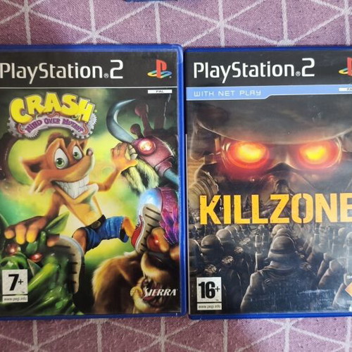 PlayStation 2 (PS2) used with 10 games and memory card