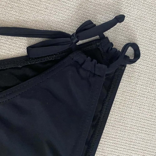 Black swimsuit unused, size M