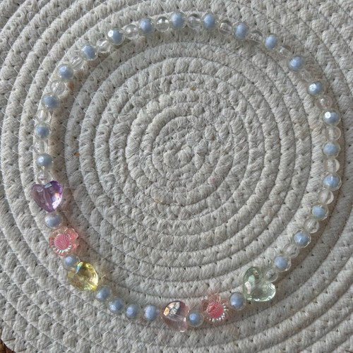 Children's necklace used with shiny transparent beads