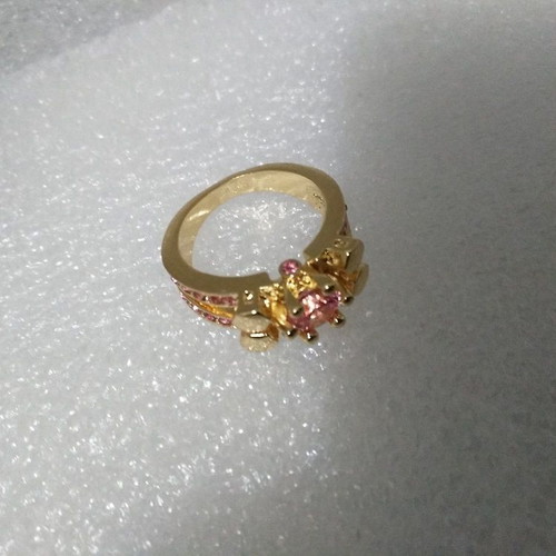 Ring with pink stones like new, gold plated size 6