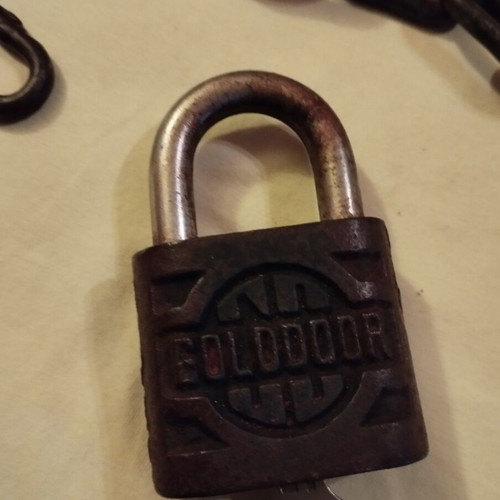 Padlock used with key, chain and skeleton key