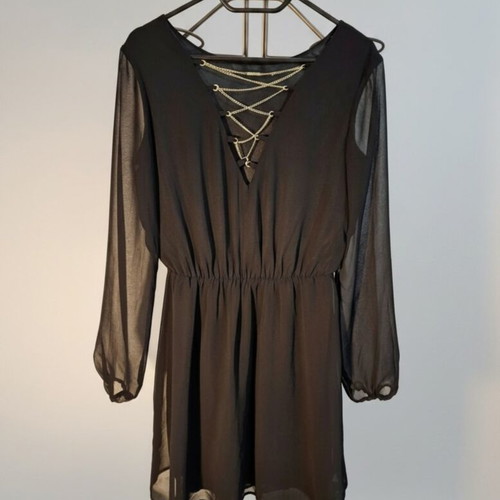 Black mini dress like new with transparency and decorative chains