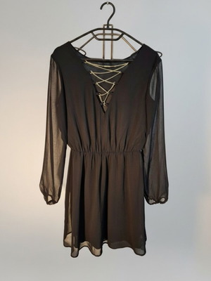 Black mini dress like new with transparency and decorative chains
