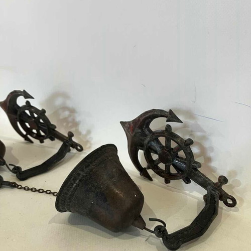 Vintage set of 2 copper wall bells with anchor and ship wheel decoration used