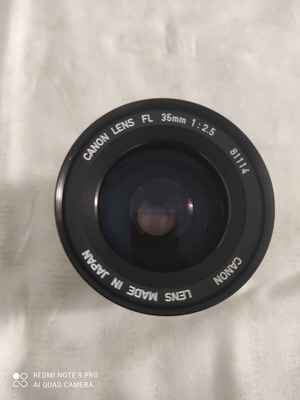 Canon FL 35mm f/2.5 wide-angle lens with HOYA 58mm 81A filter