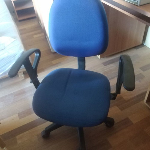 Computer desk with used office chair and wheels