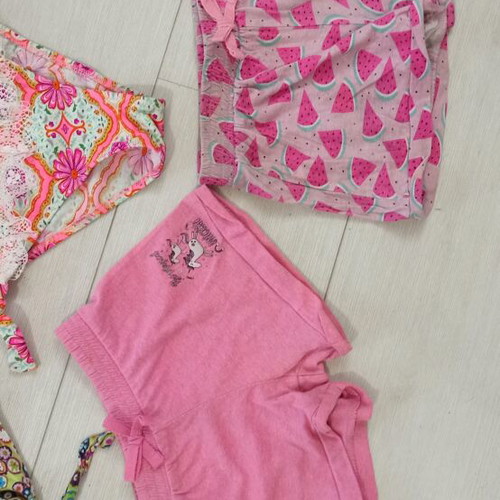 Baby clothing set like new, includes bikini, shirts, shorts up to 2 years
