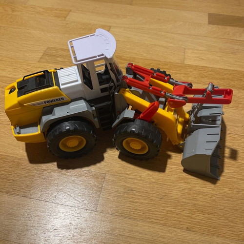 Toy excavator in like-new condition