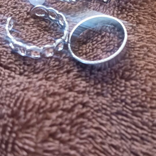 Set of 4 silver rings with different designs