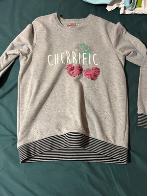 Children's sweatshirt used with reversible sequin cherry print
